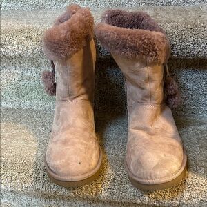 UGGS Cozy Shearling-Lined Boots with Pom Poms